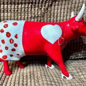 Red and White Decorative Cow Figurine